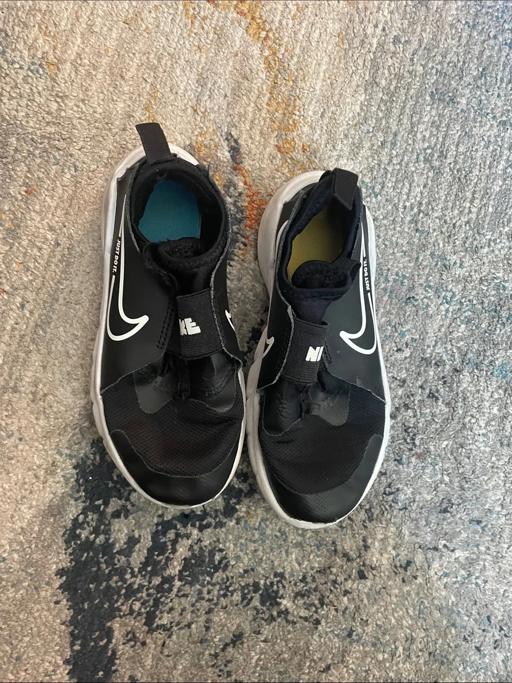 Nike Black and White Slip-On Athletic Sneakers with Colored Insoles